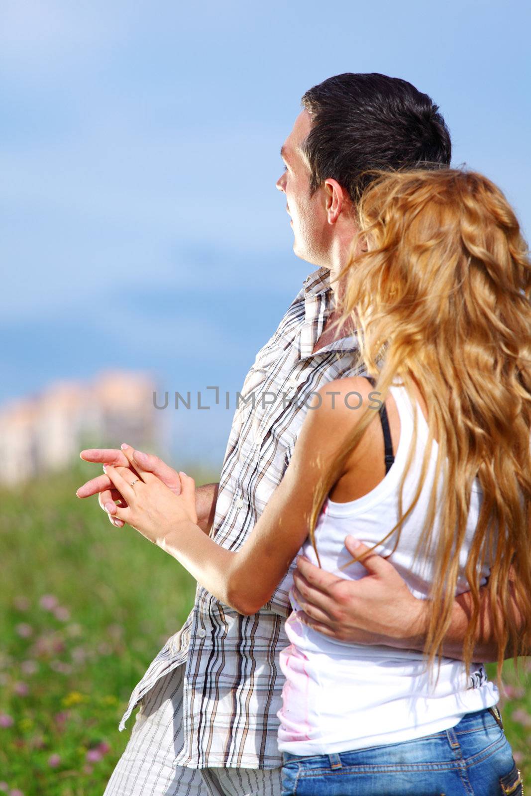 man and woman see houses and new flat