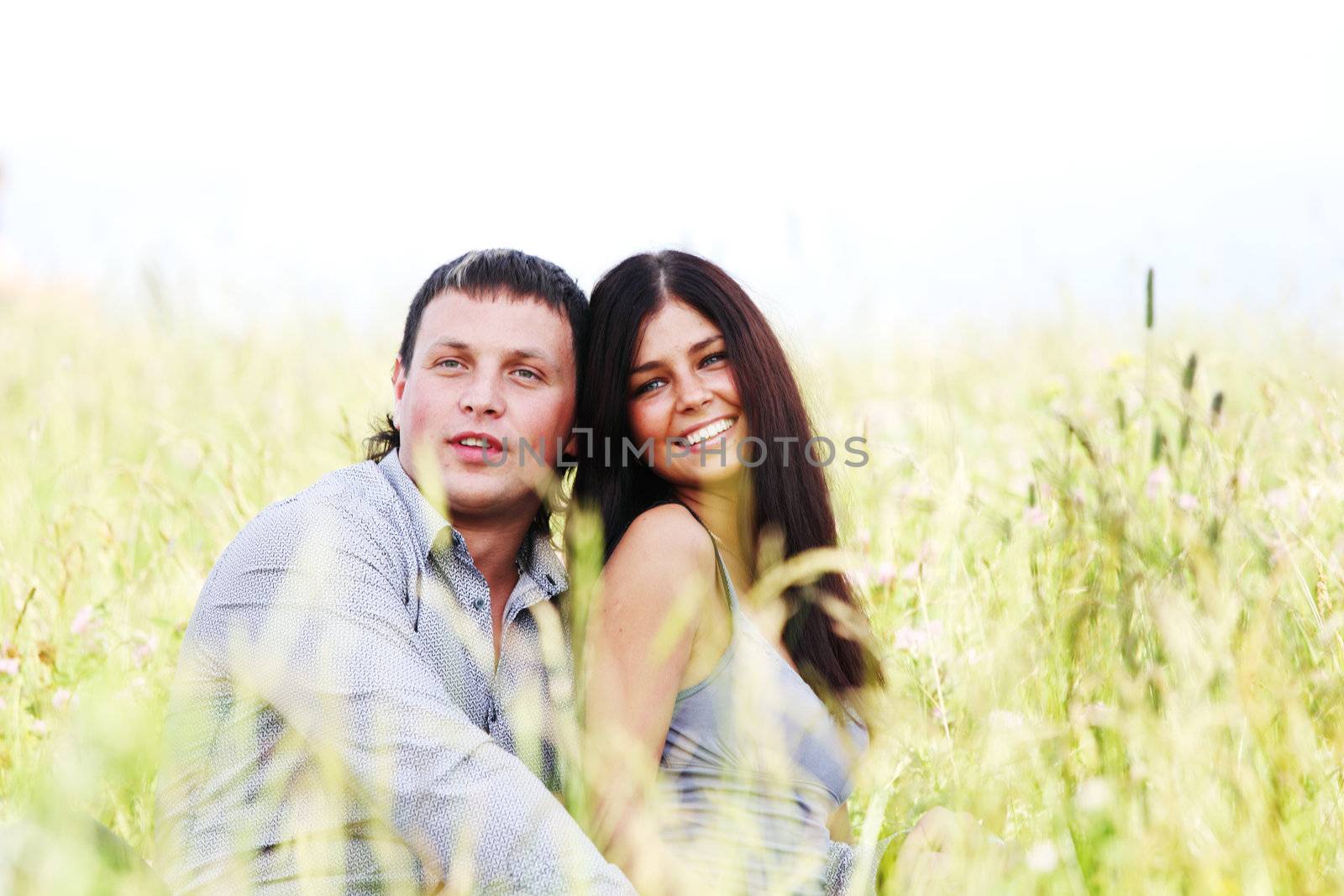 two lovers on grass field
