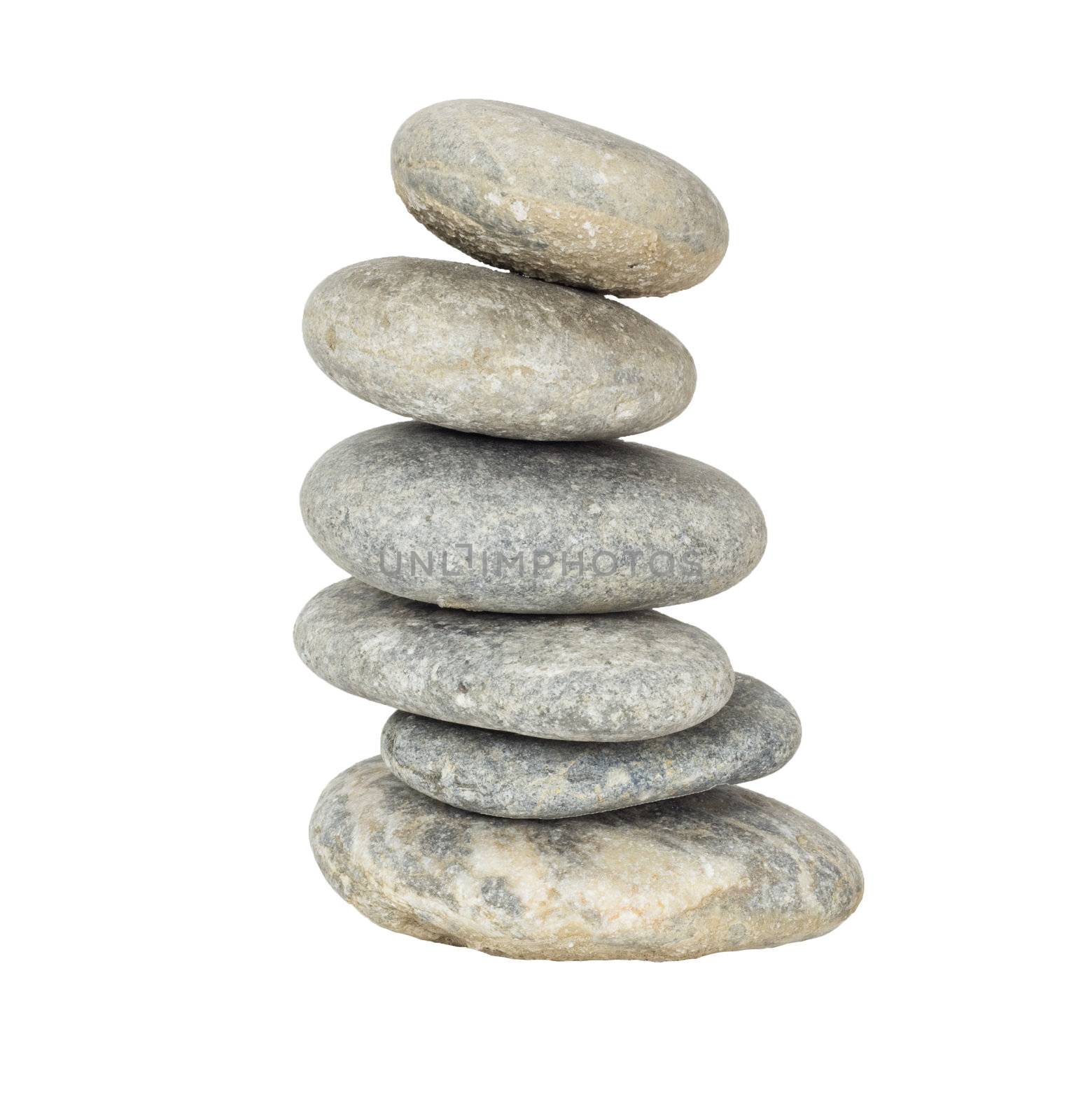 A stack of slightly off-balanced zen stones isolated on white background. 