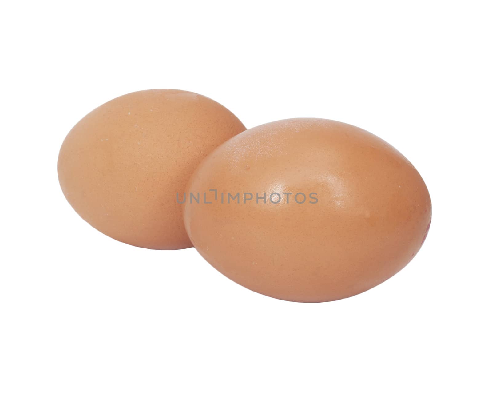 two brown eggs isolated on white background 