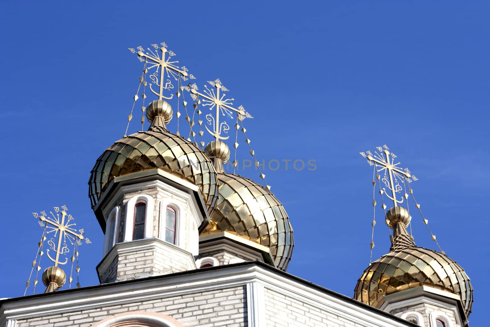 Golden dome of the Orthodox church with blue sky background, Rus by schankz