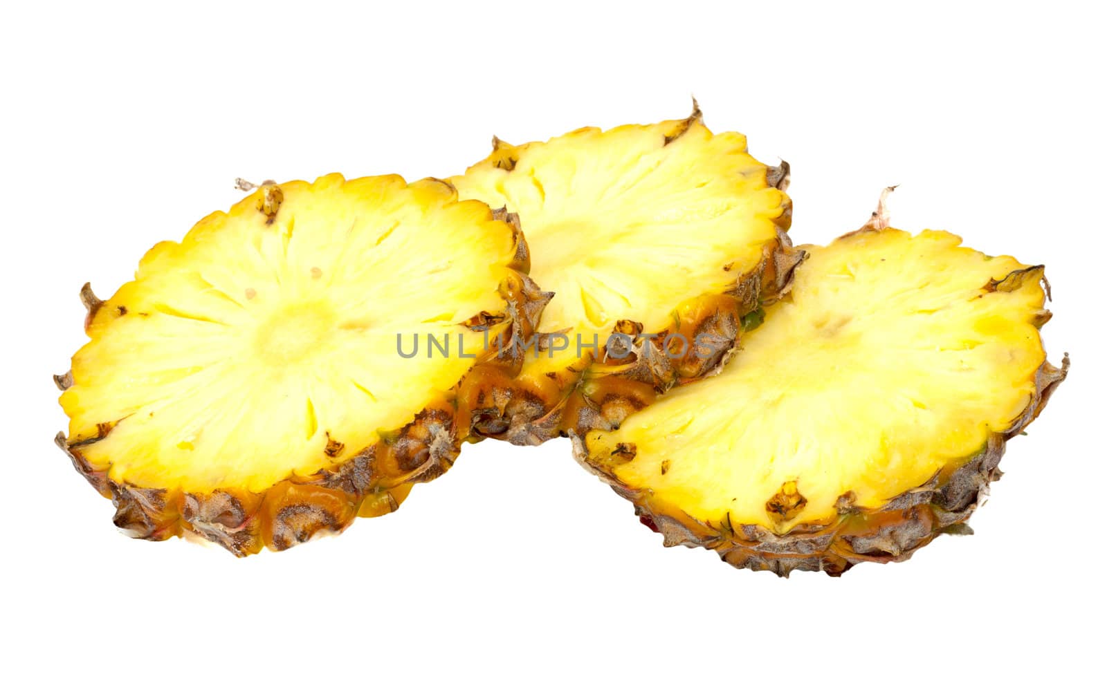 three ananas slices, isolated on white background, with light shadow 