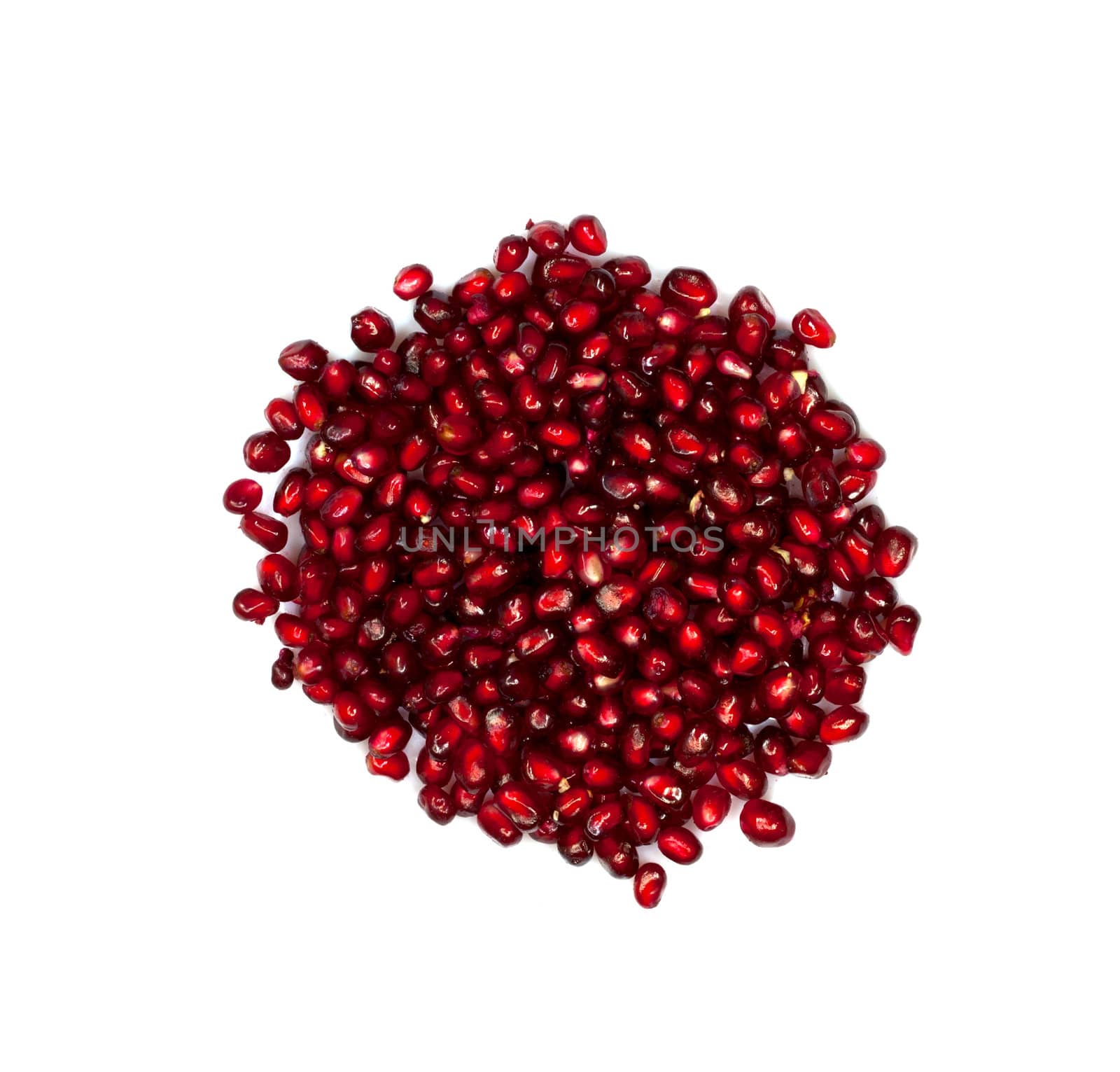 Extreme close up background of a red juicy ripe pomegranate fruit seeds 