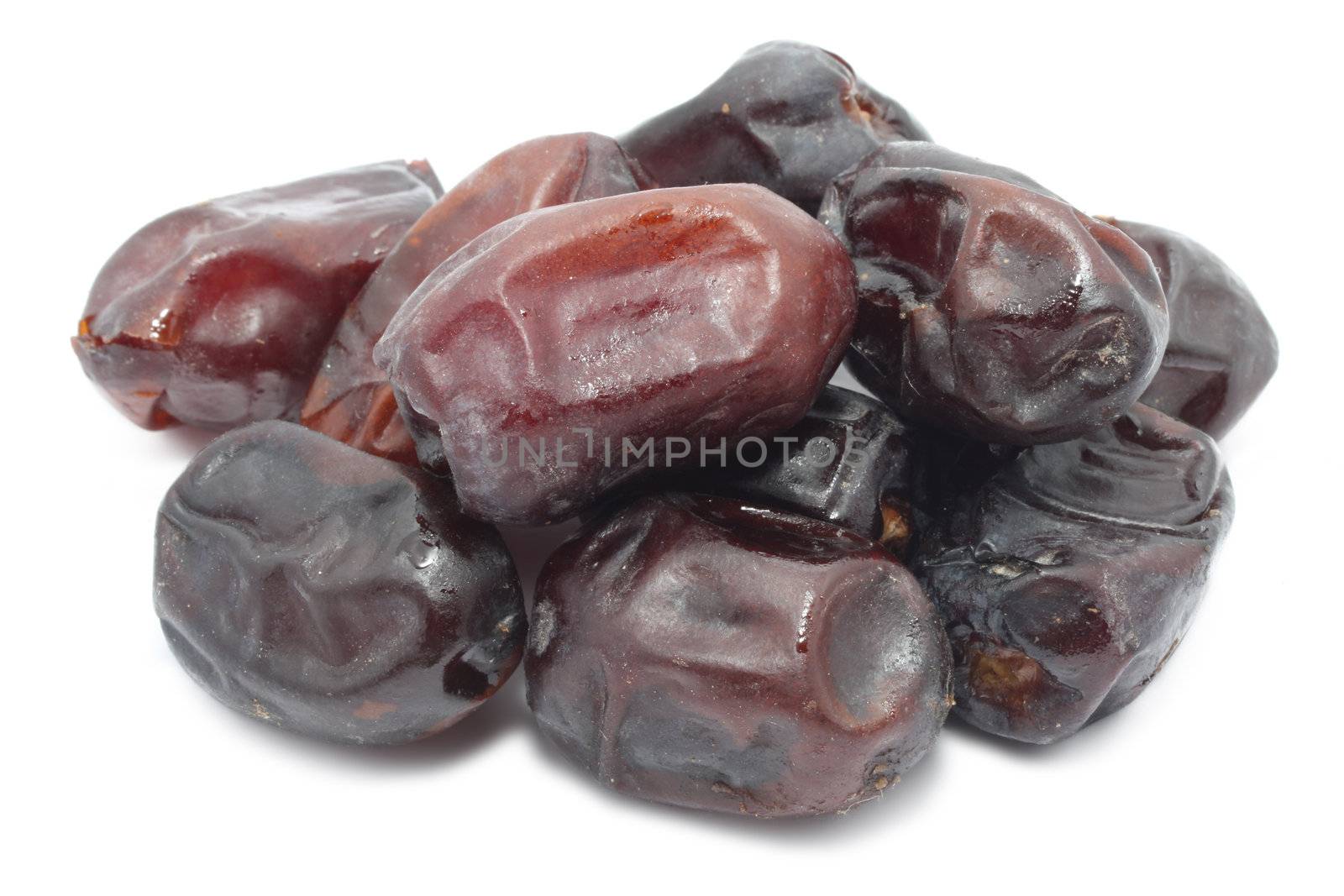 Dried date fruits isolated on white background