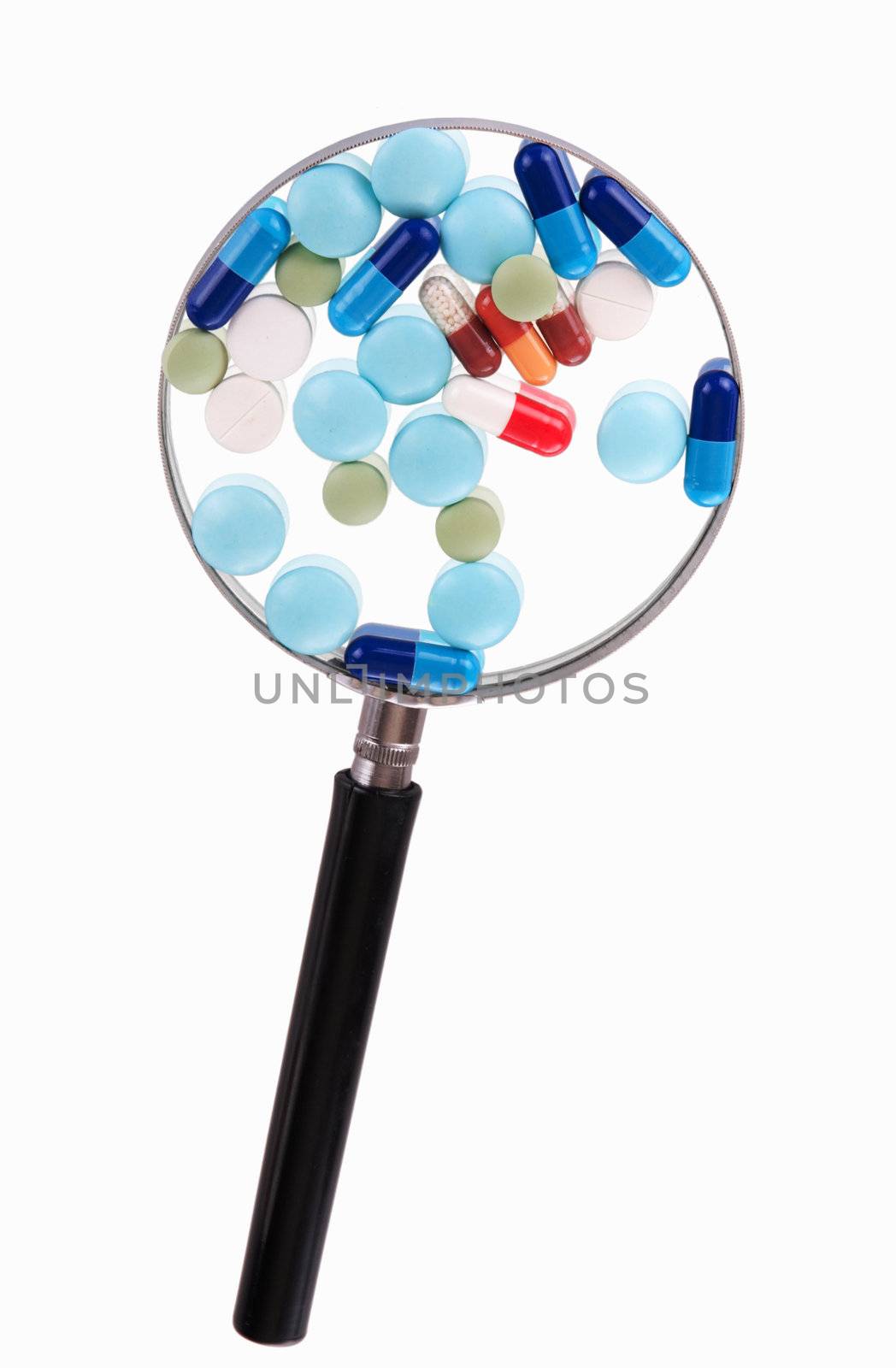 Pills on magnifying glass by iryna_rasko