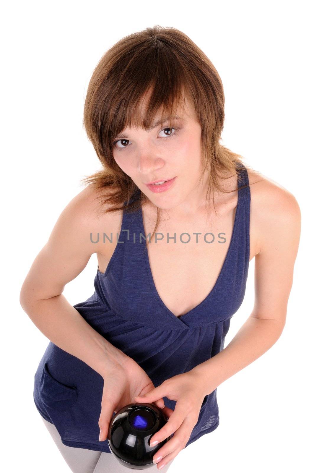 Young casual woman read fortunes by a ball isolated on white background