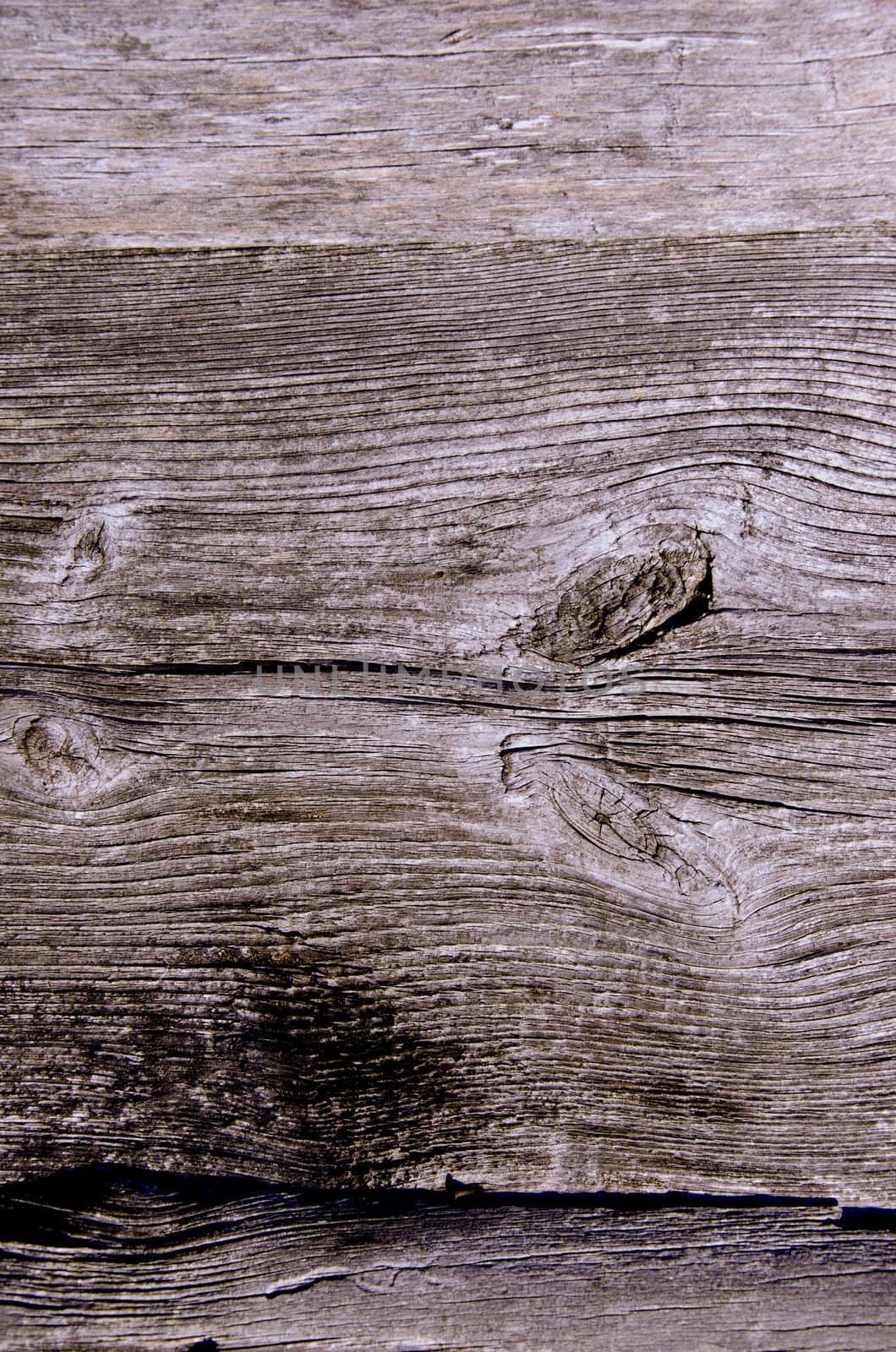 Old wooden wall fragment texture background. by sauletas