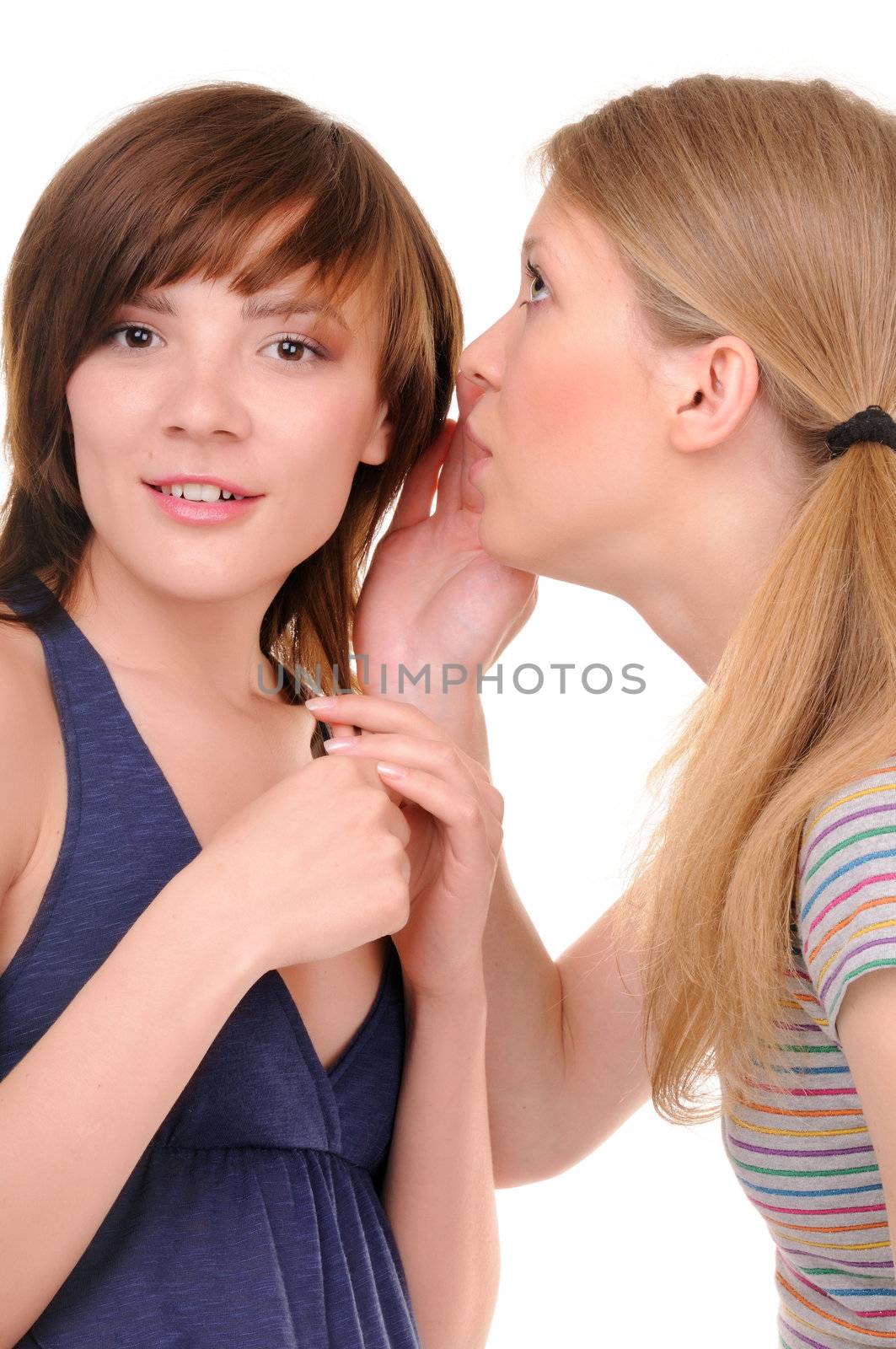 Two young womans are talking with each other on white background