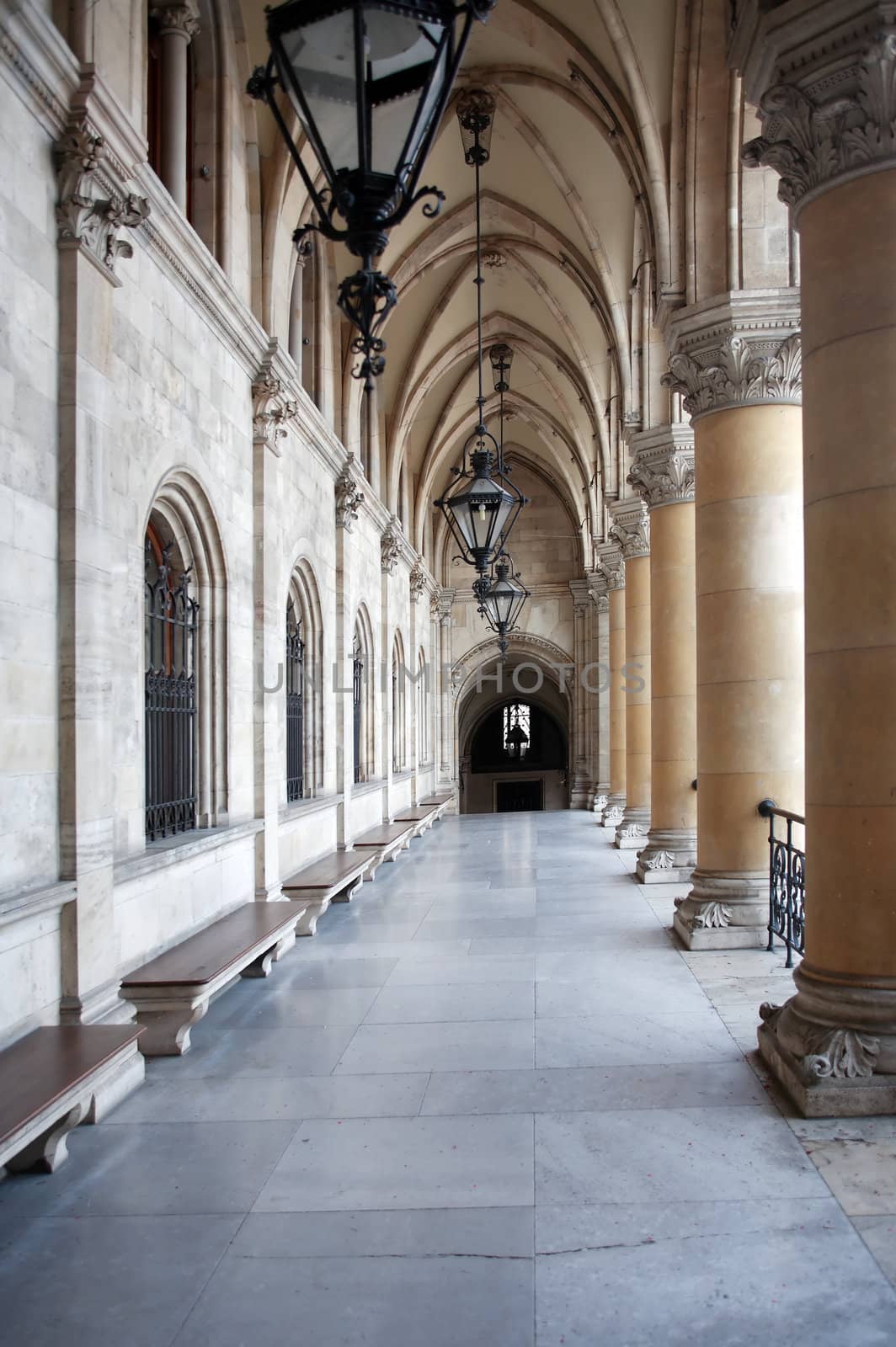 Elegance marble old colonnade with hanging lanterns