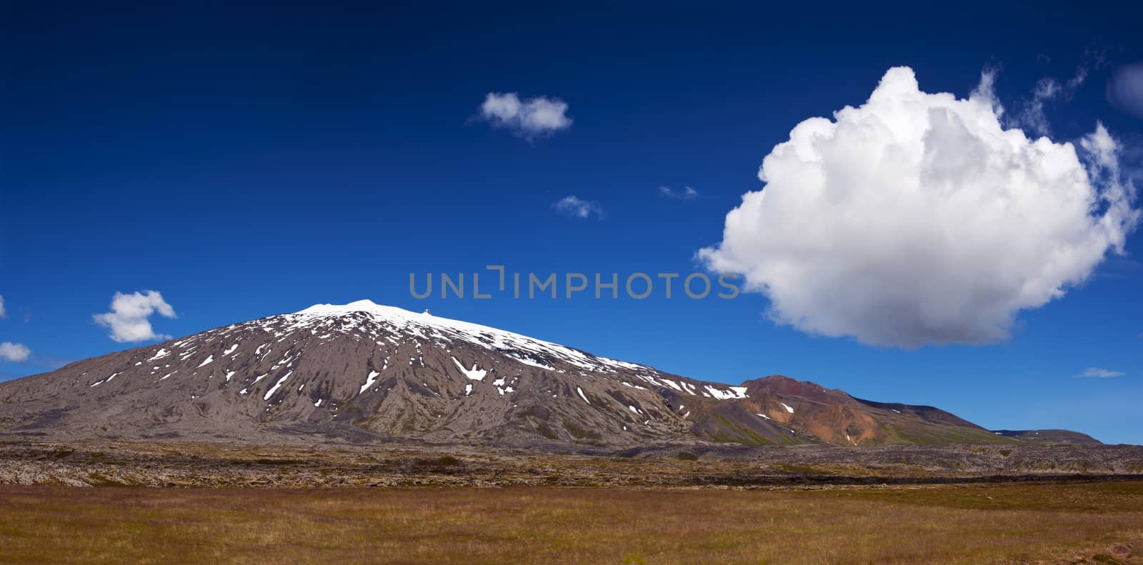 Volcano Snaefell on the western end of Icelandic peninsula Snaefellsnes is covered by a glacier Snaefellsjokull, panoramic photo 
