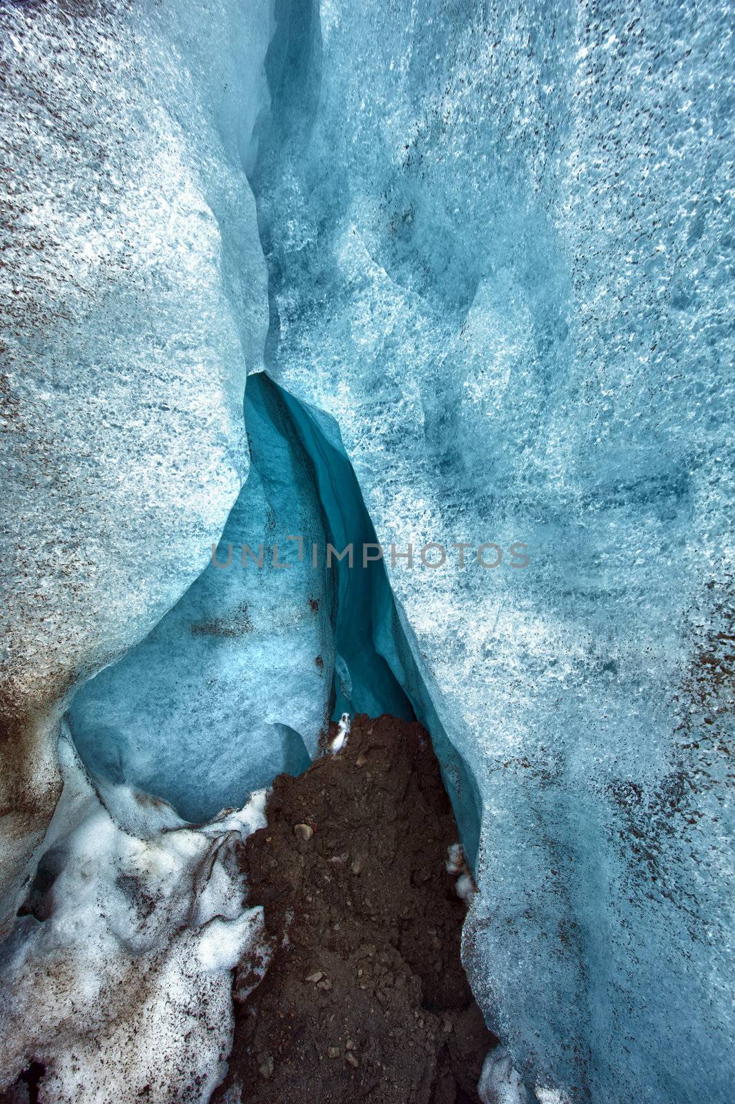 Detailed photo of the Icelandic glacier ice cave with a incredibly vivid colors and a nice texture