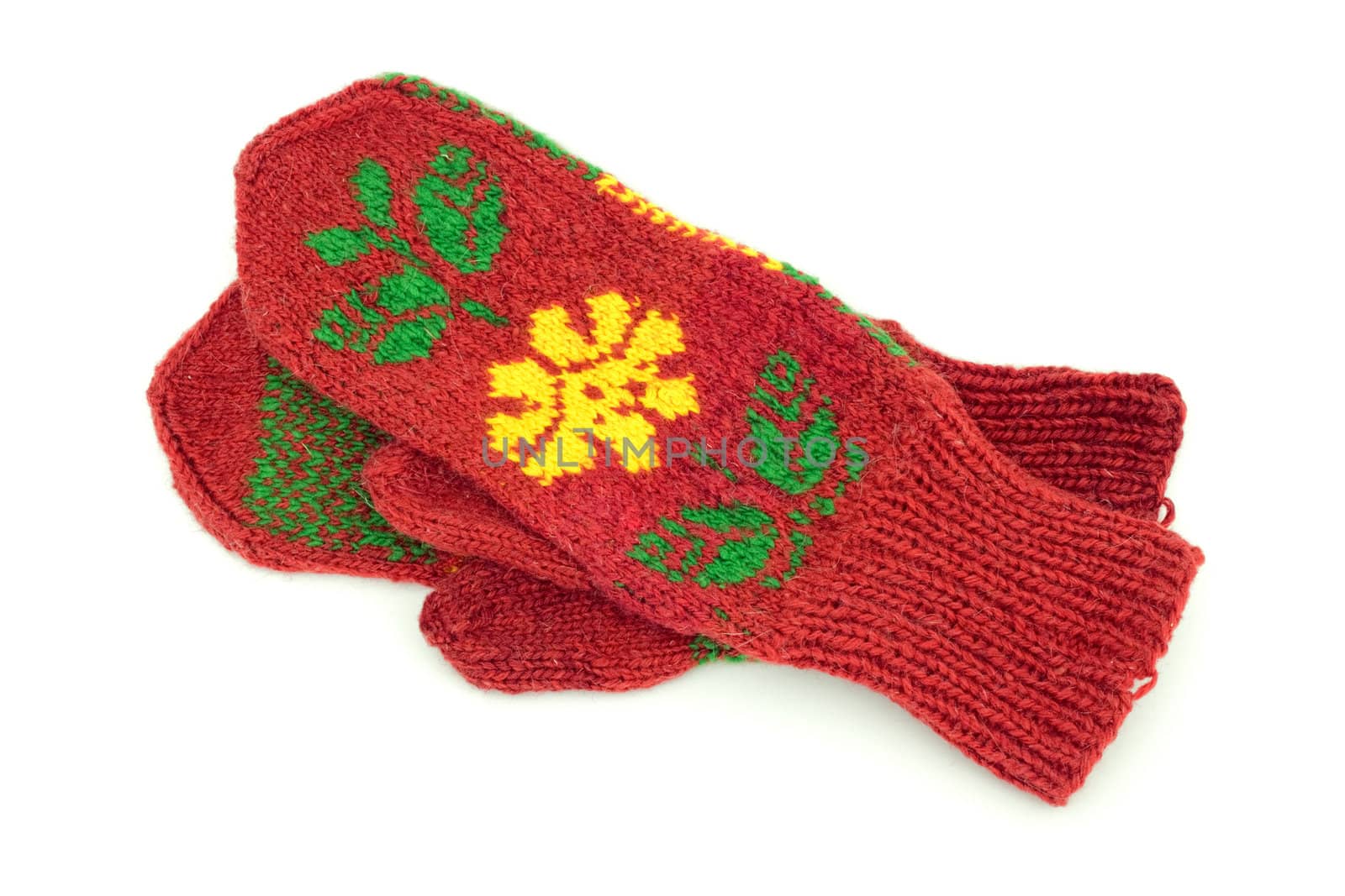Two crocheted mittens on a white background
