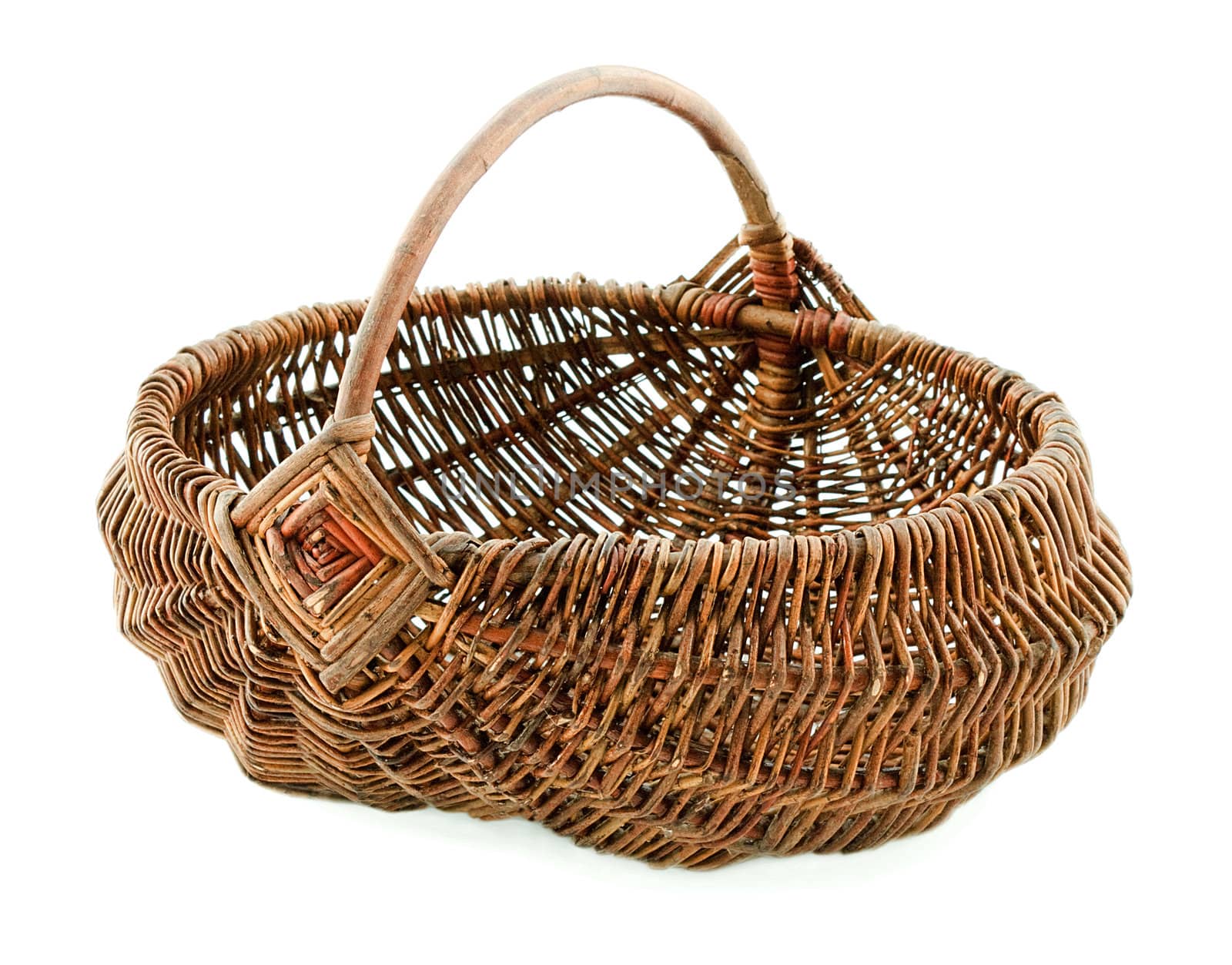 Basket in wattled from willow rods in white background