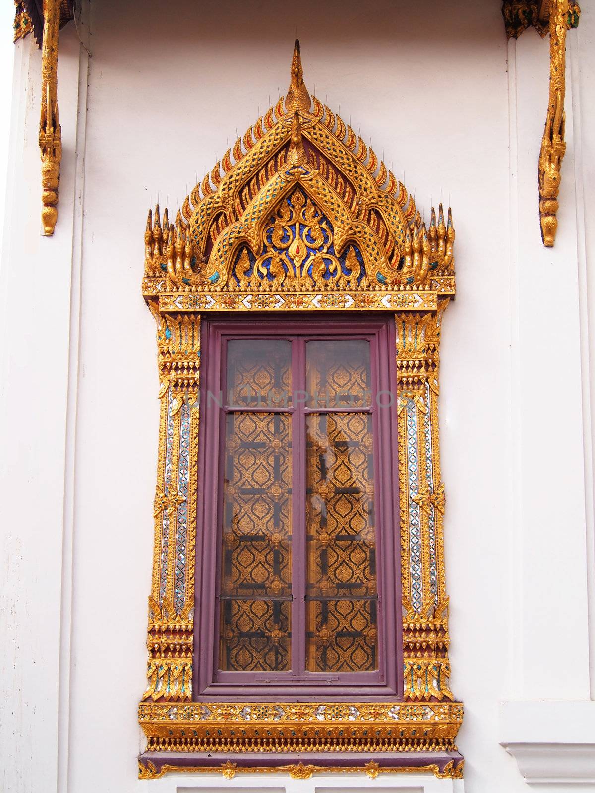 Traditional Thai style window at emerald buddha temple,bankok,thailand   
