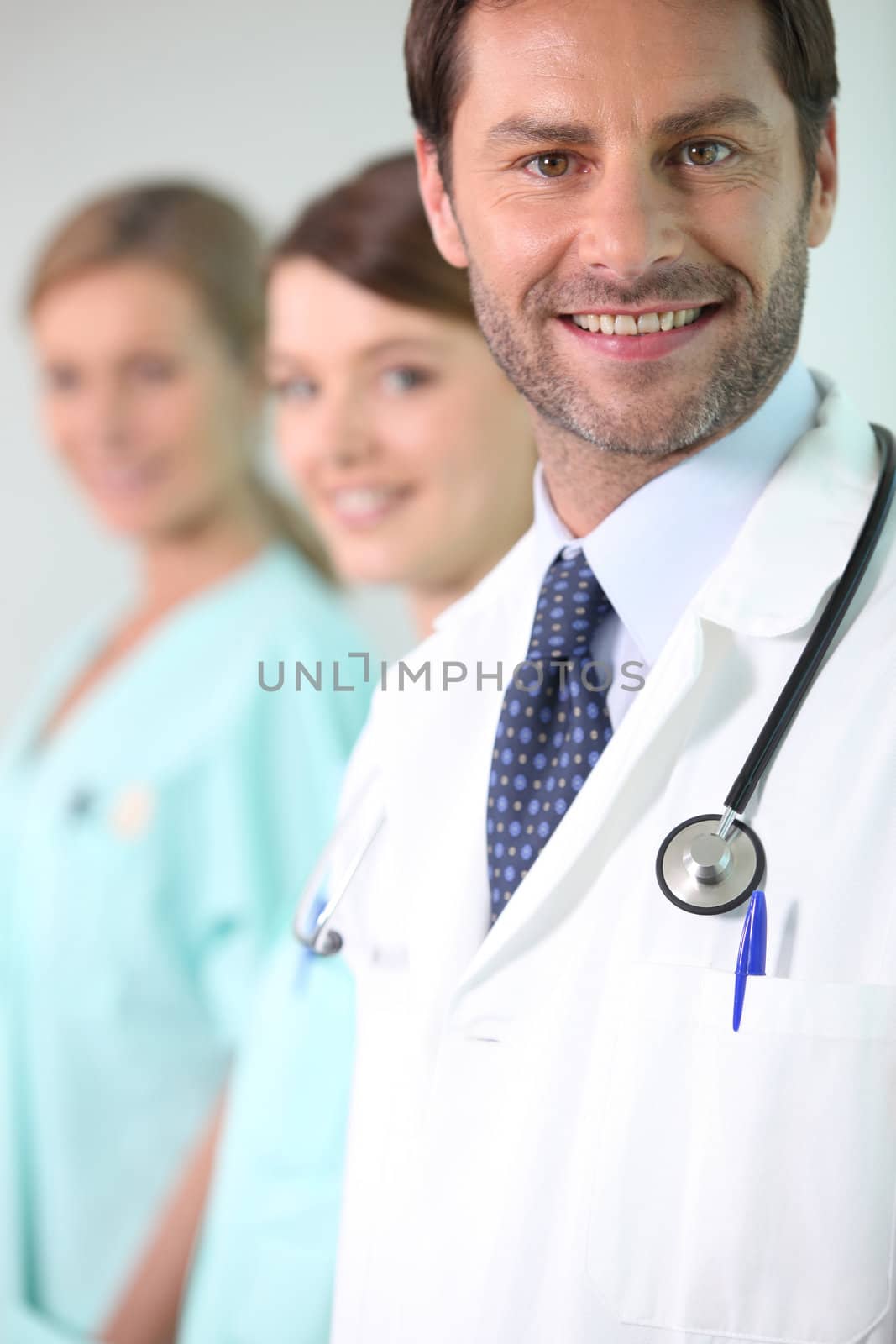 Doctor and nurses by phovoir