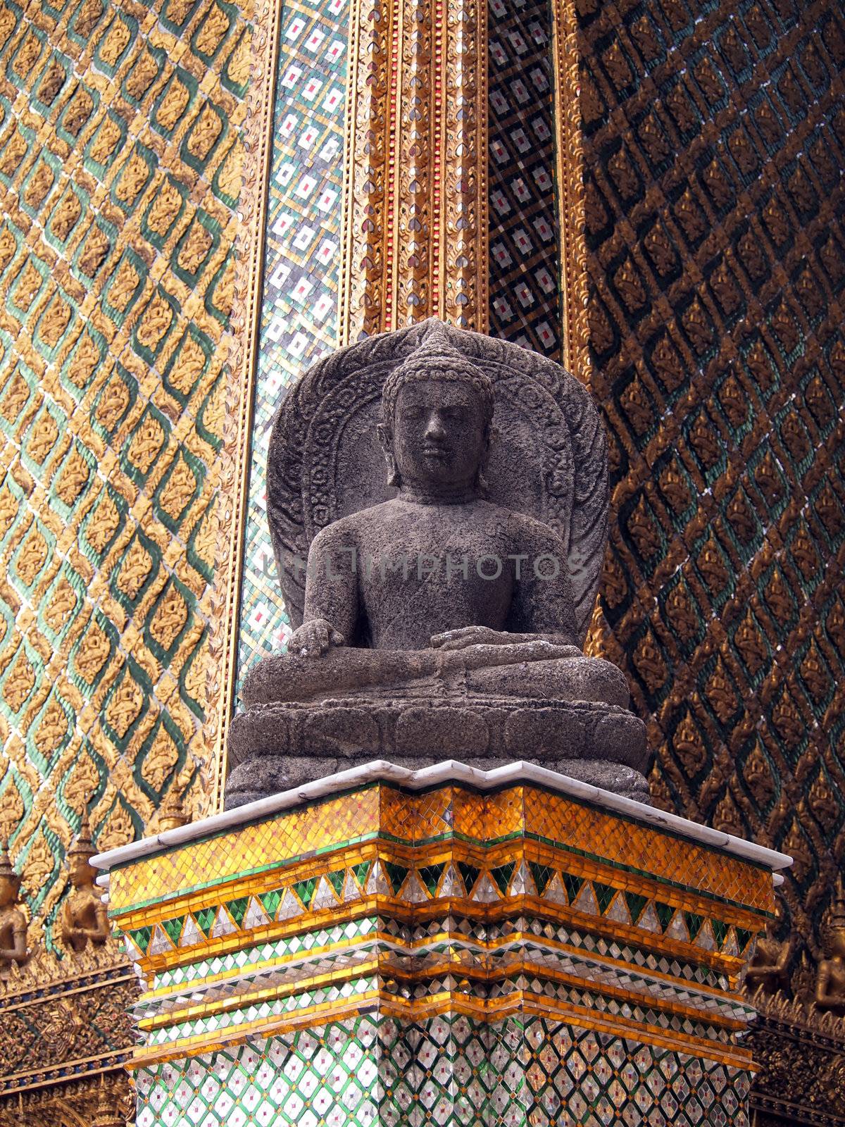 Buddha in Wat Phra Kaew (Temple of the Emerald Buddha), Bangkok Thailand.    