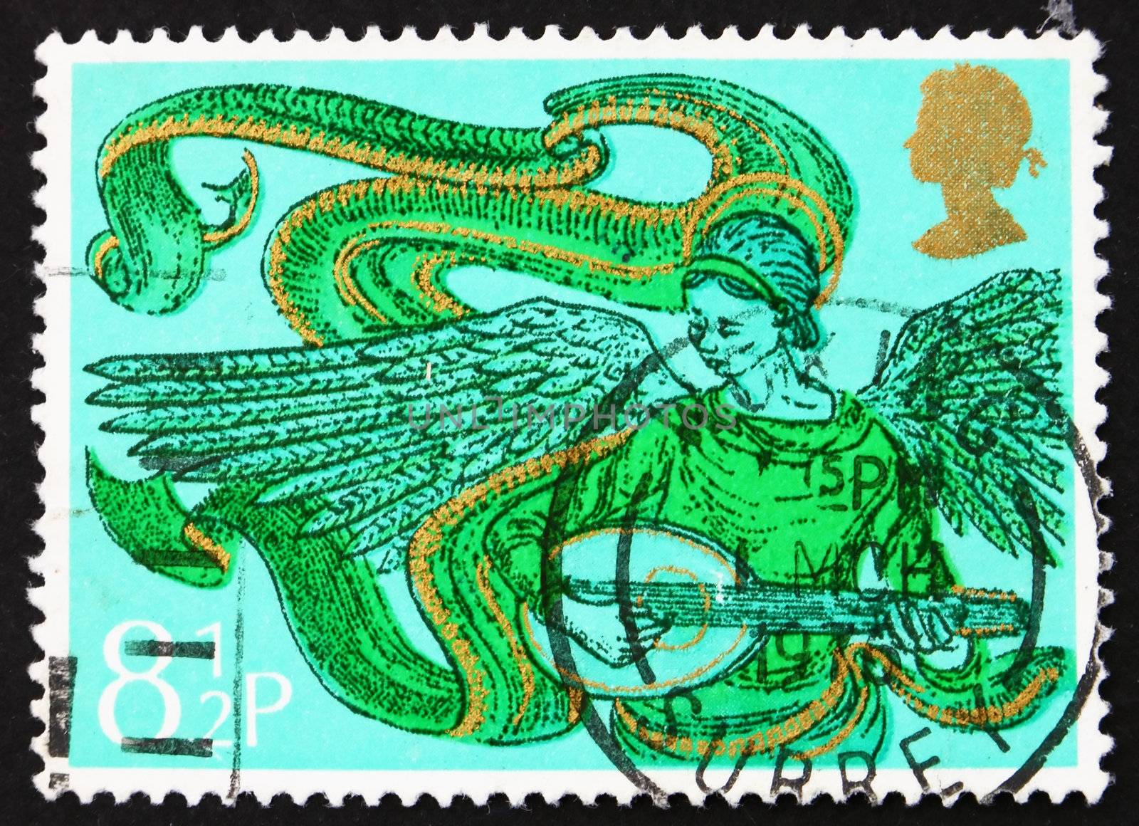 GREAT BRITAIN - CIRCA 1975: a stamp printed in the Great Britain shows Angel with Mandolin, Christmas, circa 1975