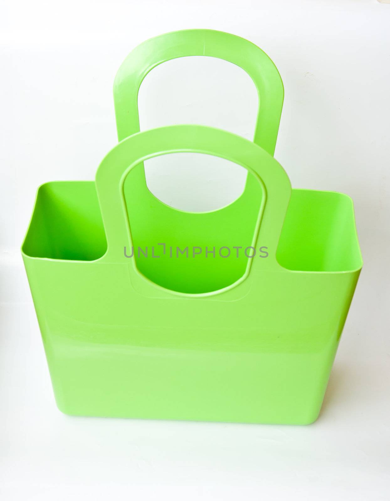 green plastic  bag on white background