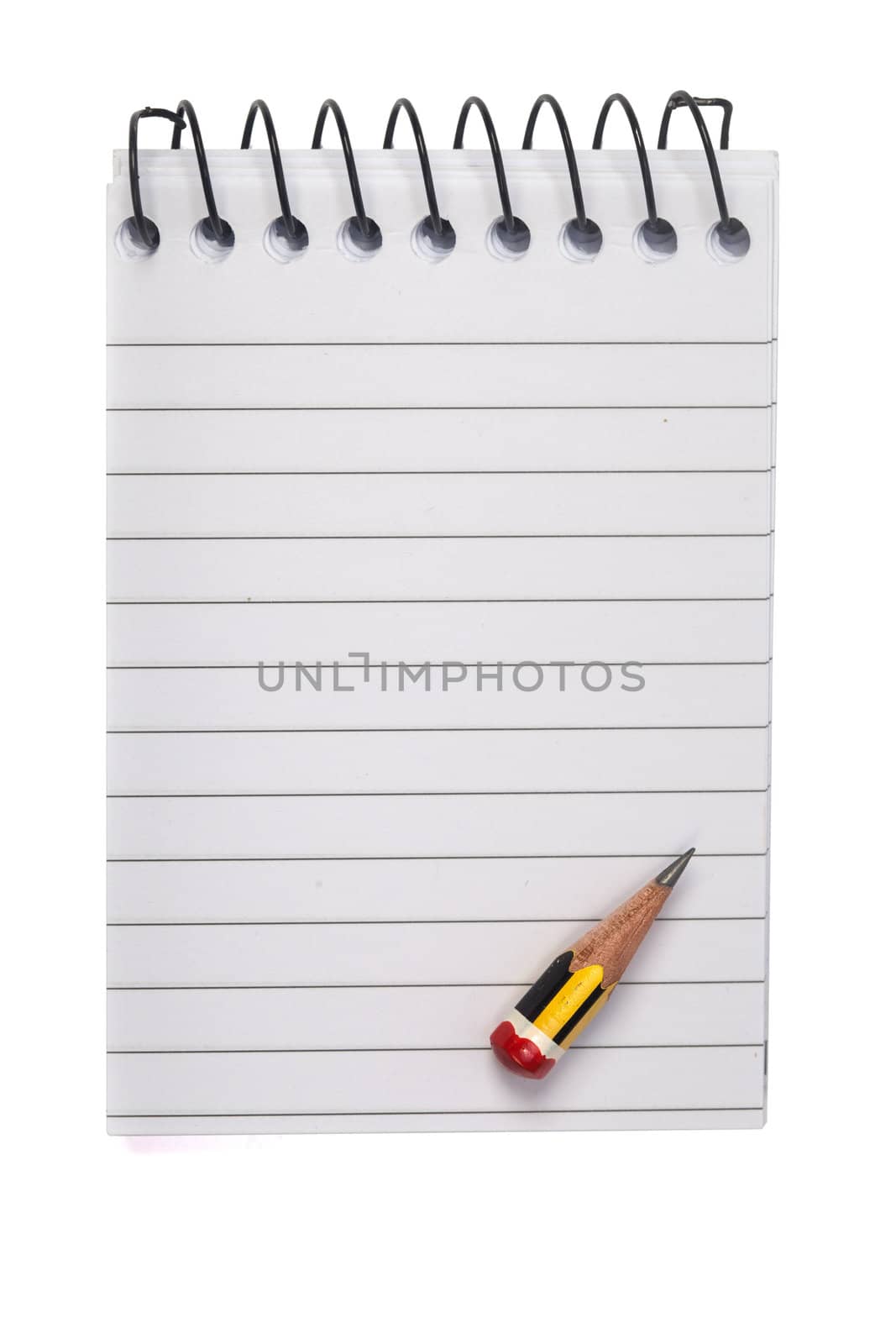 A small and very sharp pencil on a notepad, isolated on a white background.