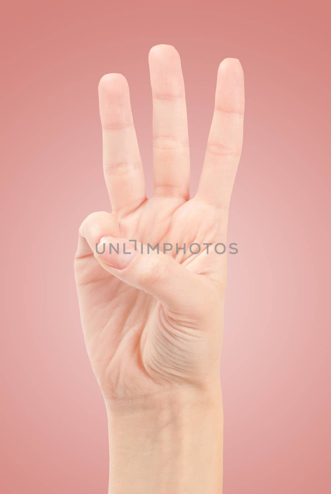 Female hands counting number three isolated on white