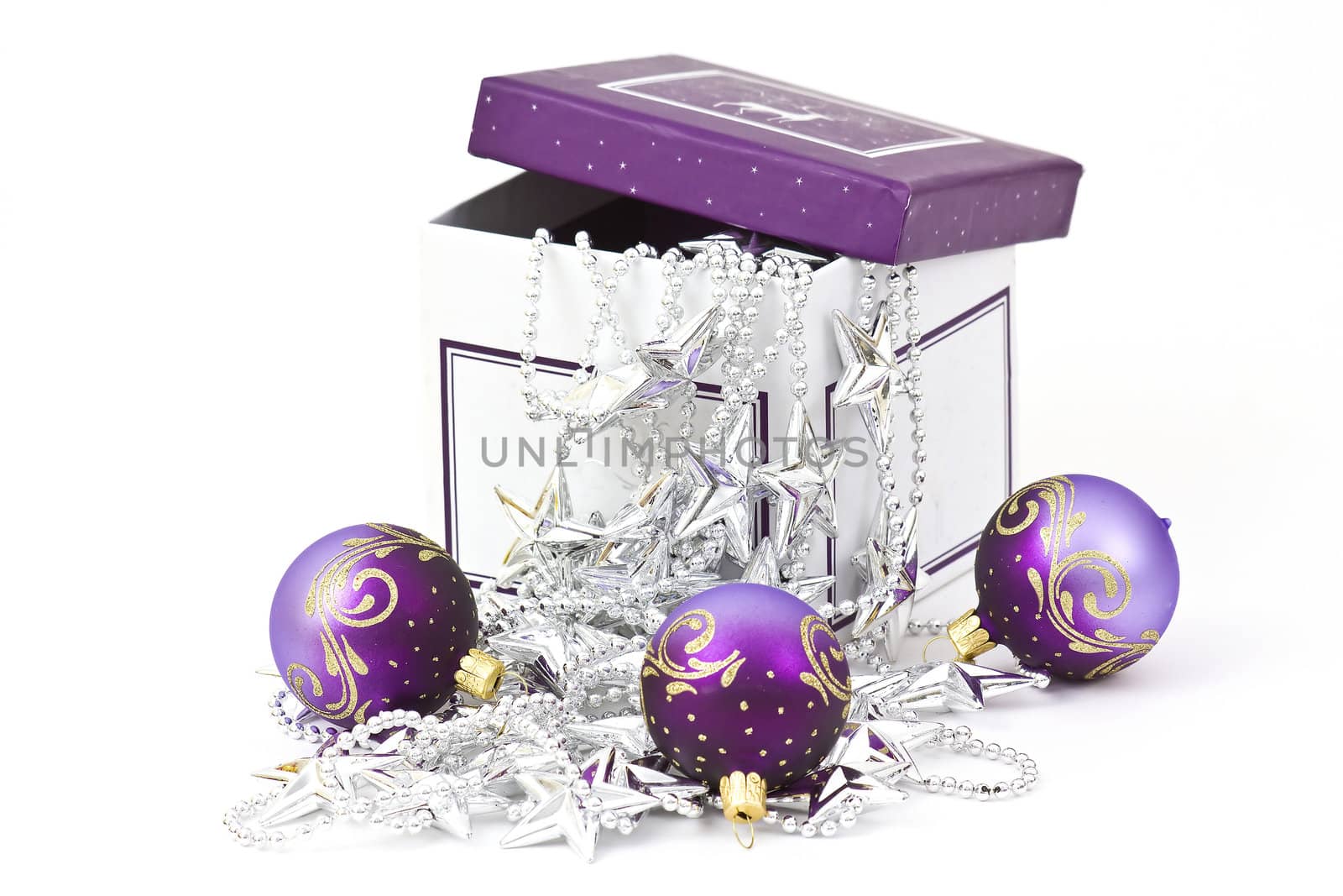 Christmas gift box with christmas balls and silver garland