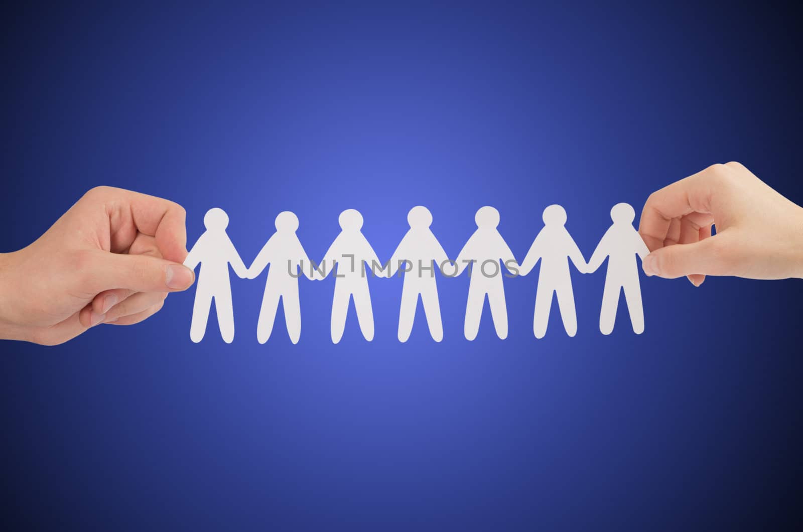 paper people in hands(man and woman)