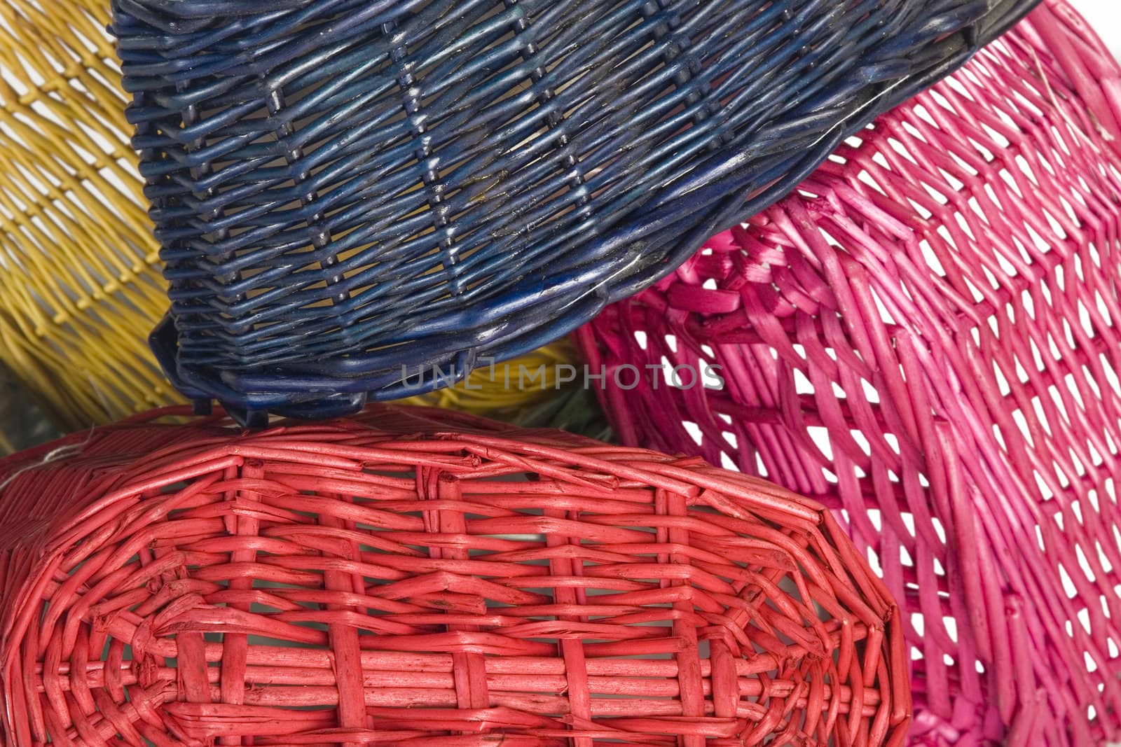 isolated on white woven straw baskets