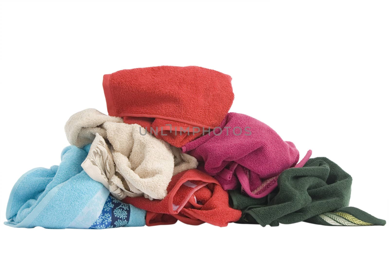 stacked of colorful towels on a white background