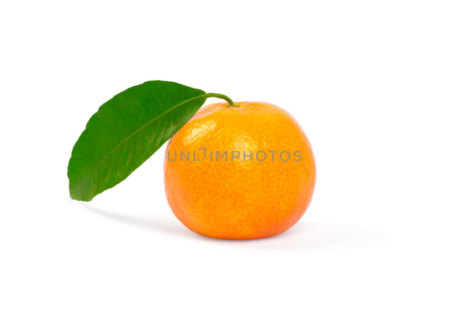 Tangerine with green leaves isolated on white