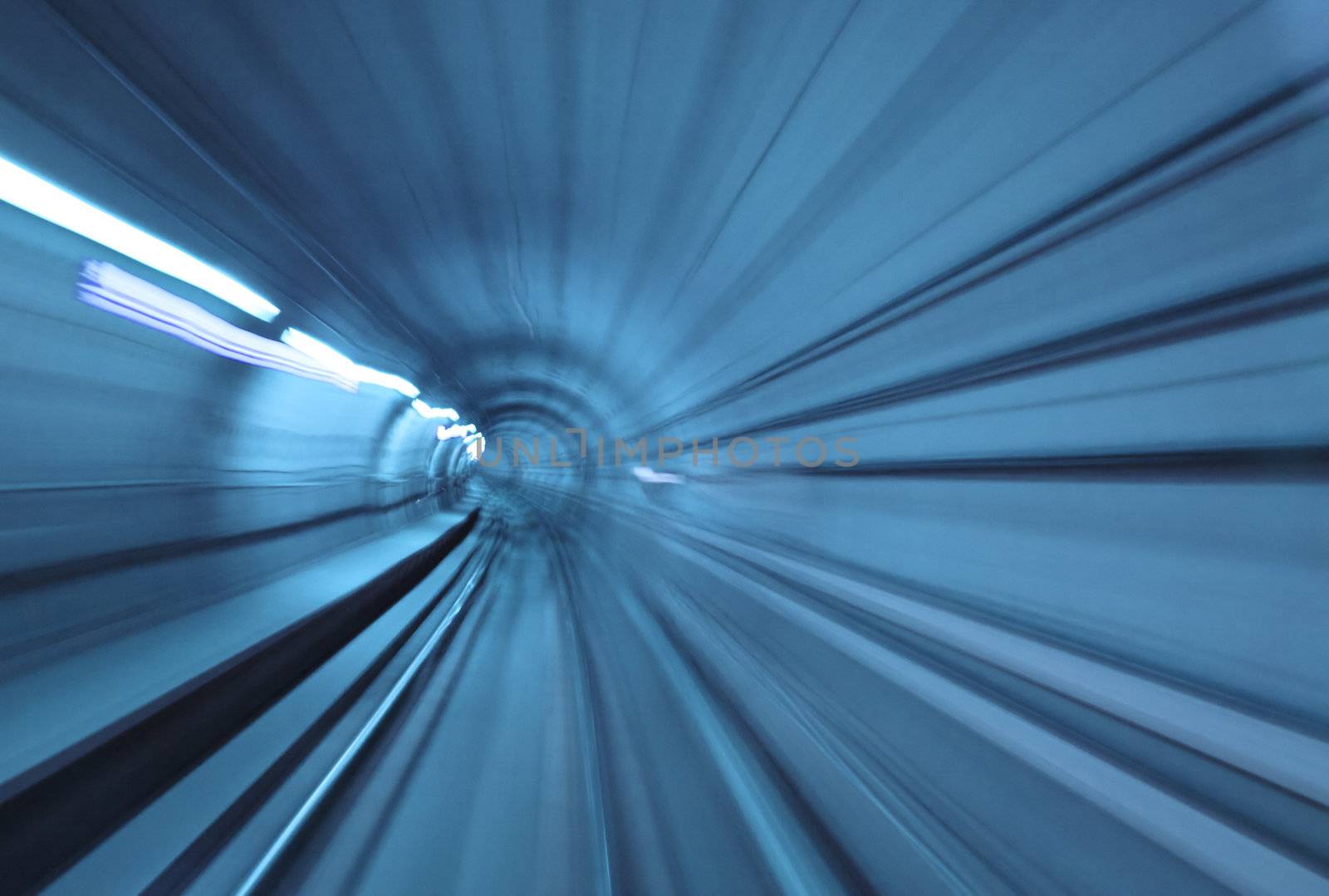 Abstract blue tunnel with motion blur at high speed