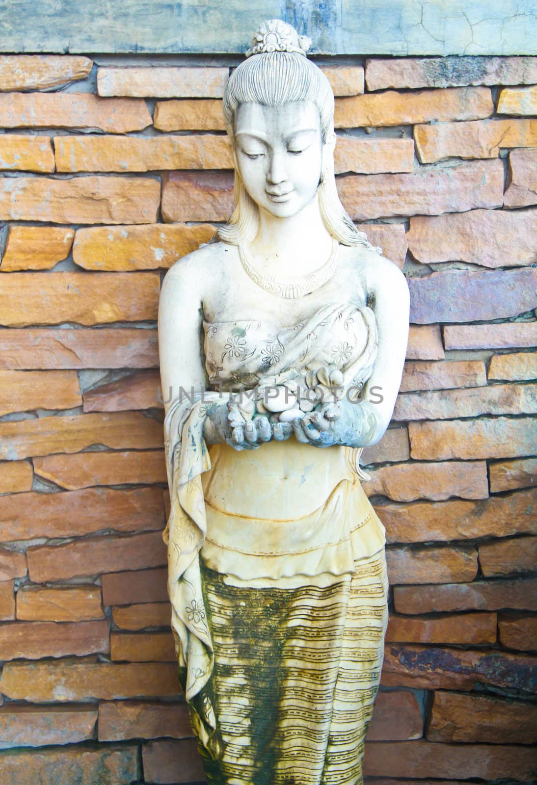 beautiful sculpture of woman in restaurant