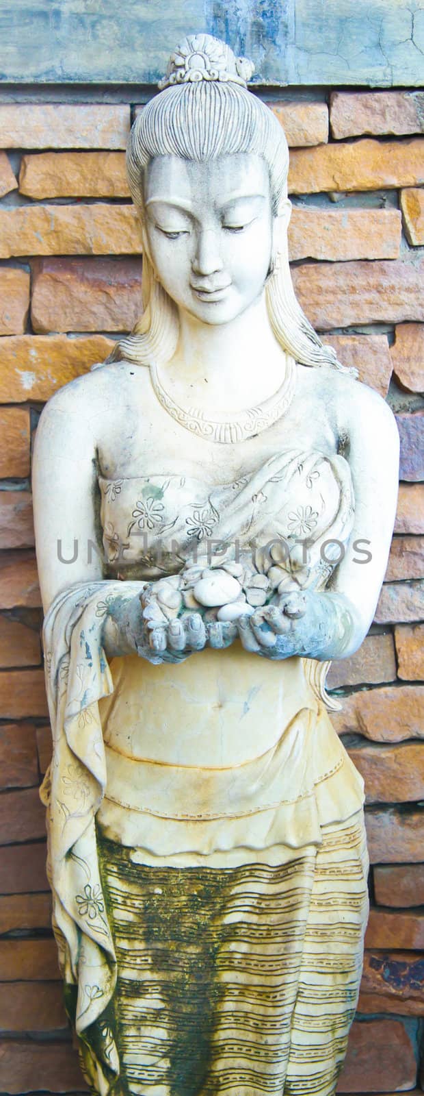 beautiful sculpture of woman in restaurant