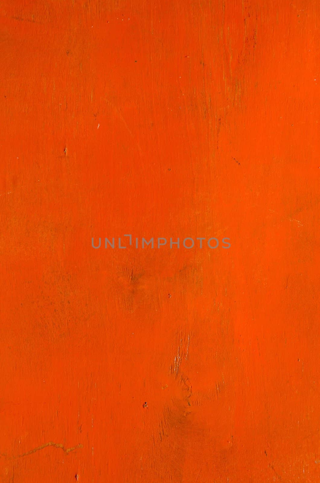 Wooden plank orange color paint background.