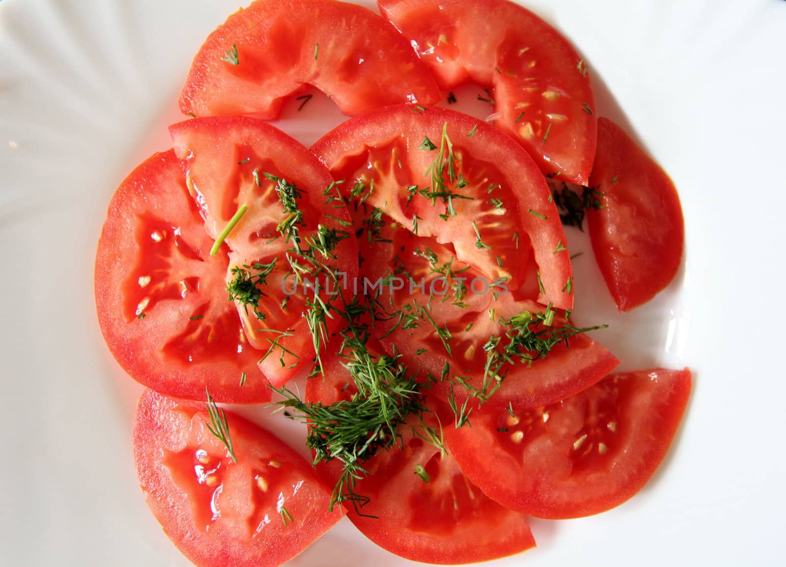 Salad of ripe tomato with dill