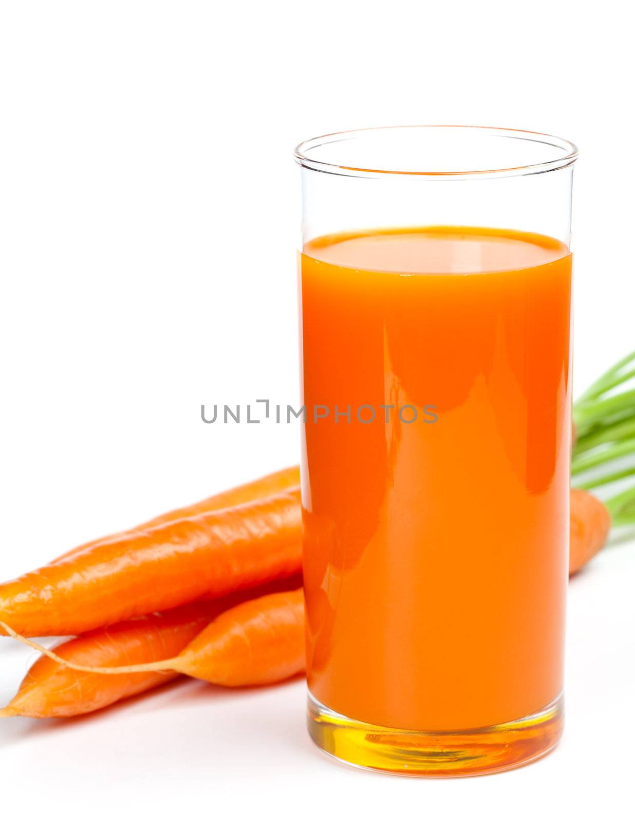 Carrot juice and fresh carrot, isolated on white background by motorolka