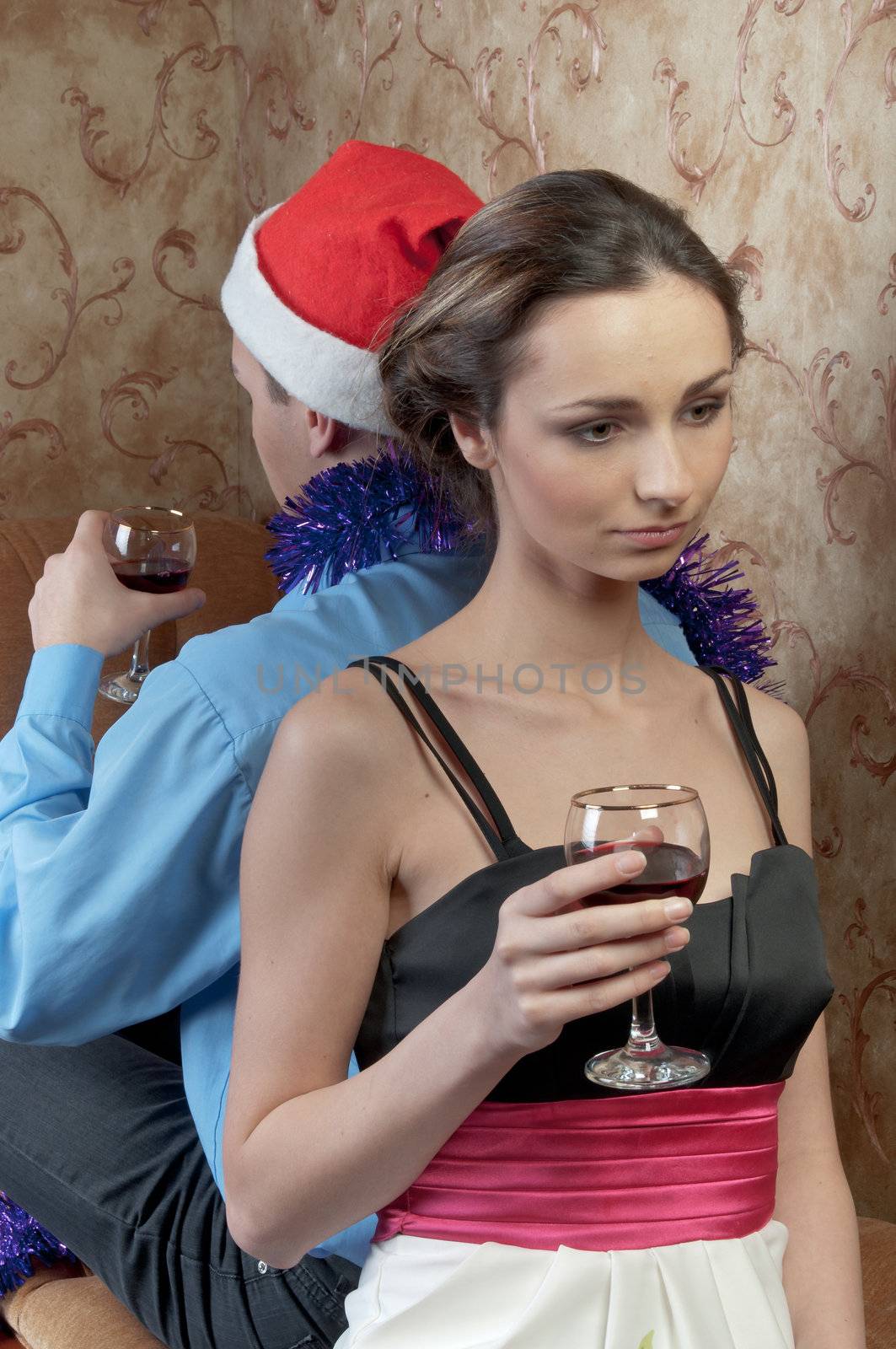 A pair of young and beautiful people are going through a fight on Christmas Eve