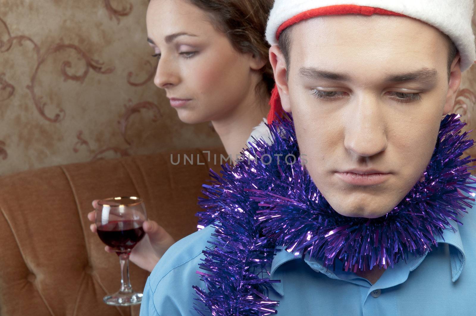 A pair of young and beautiful people are going through a fight on Christmas Eve