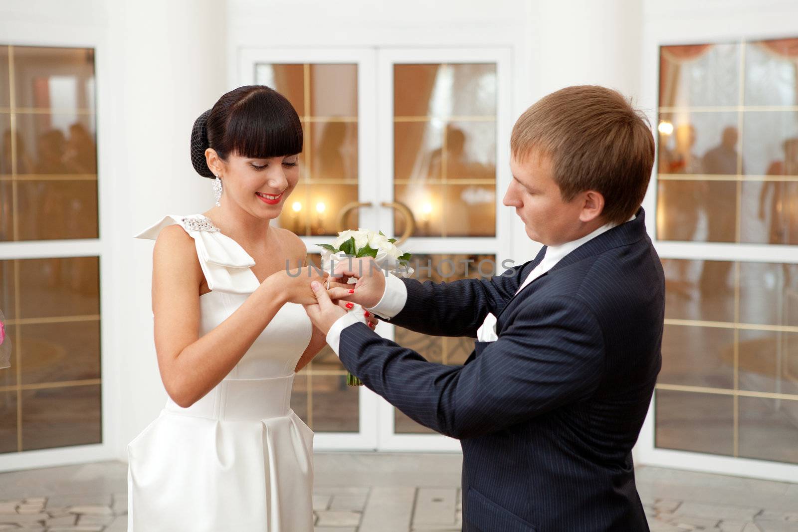 putting on a wedding ring