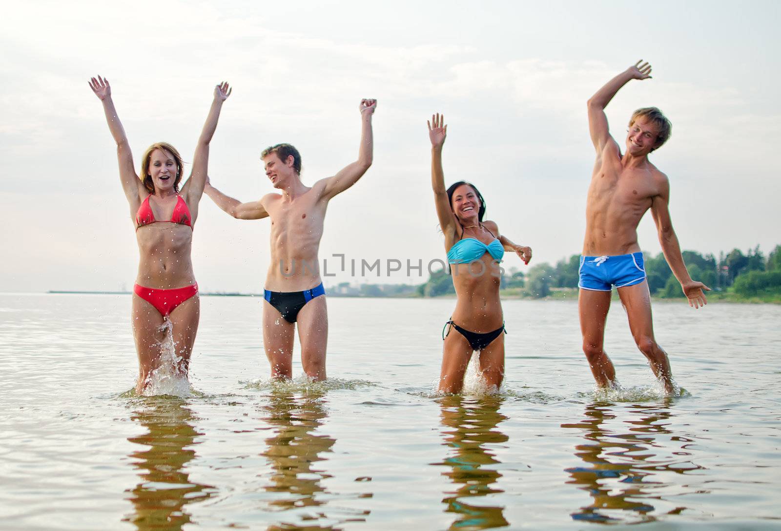 Friends having fun in the sea