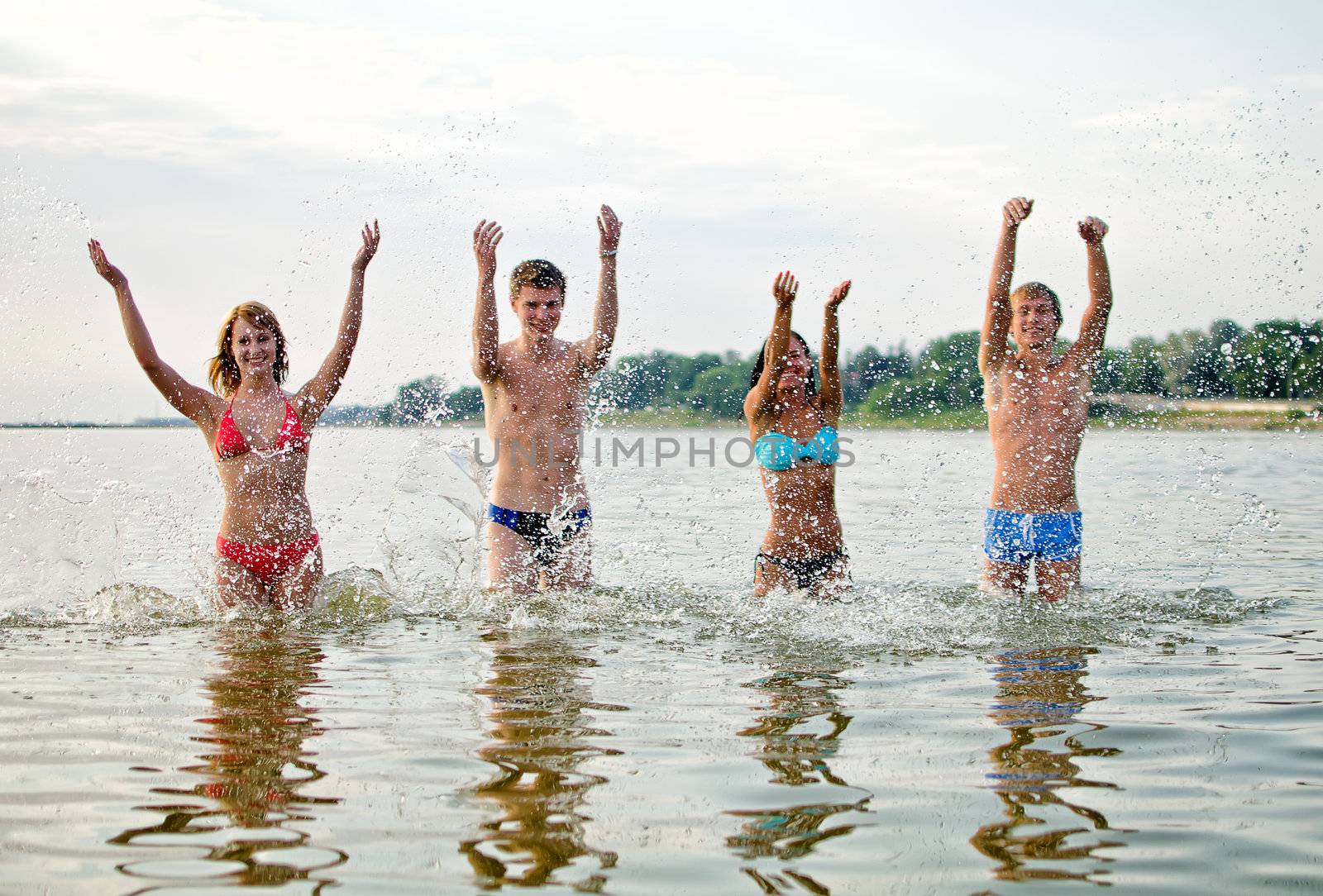 Friends having fun in the sea