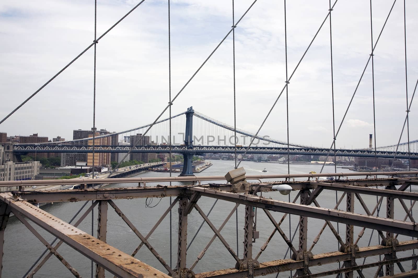 A view on New York City from the Brooklyn Bridge.