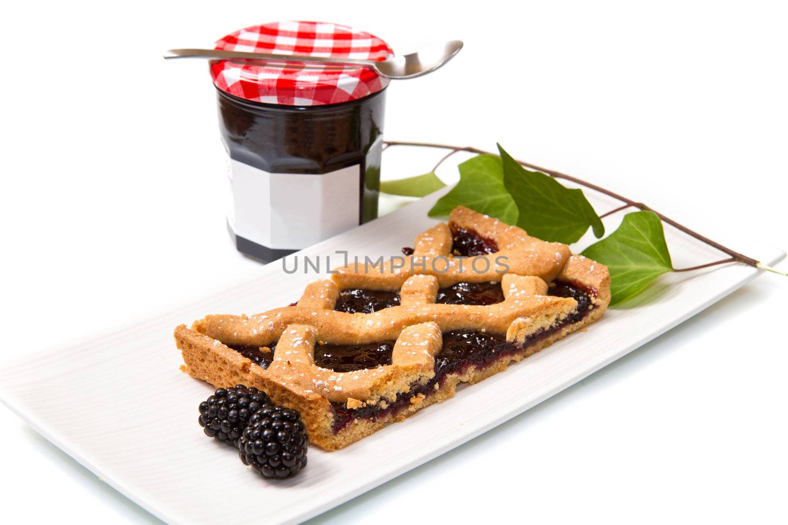blackberry tarte on white background