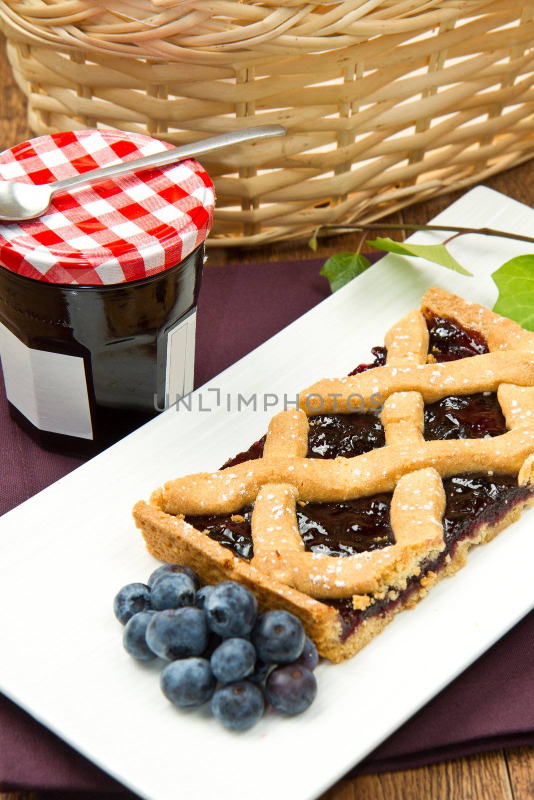 blueberry tarts on wooden table