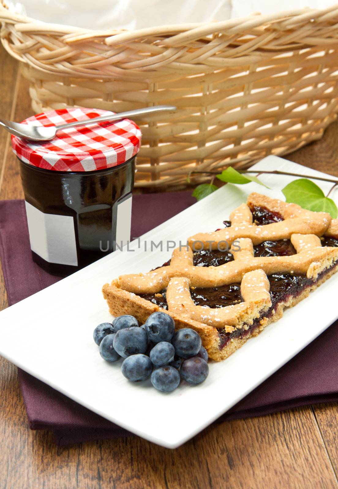 blueberry tarts on wooden table