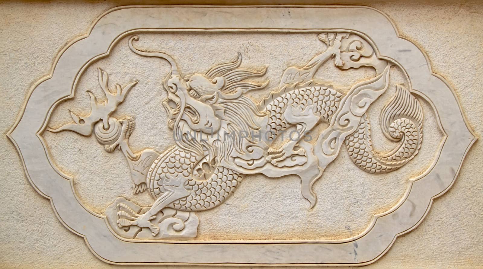 Closeup with dragon statue in chinese temple