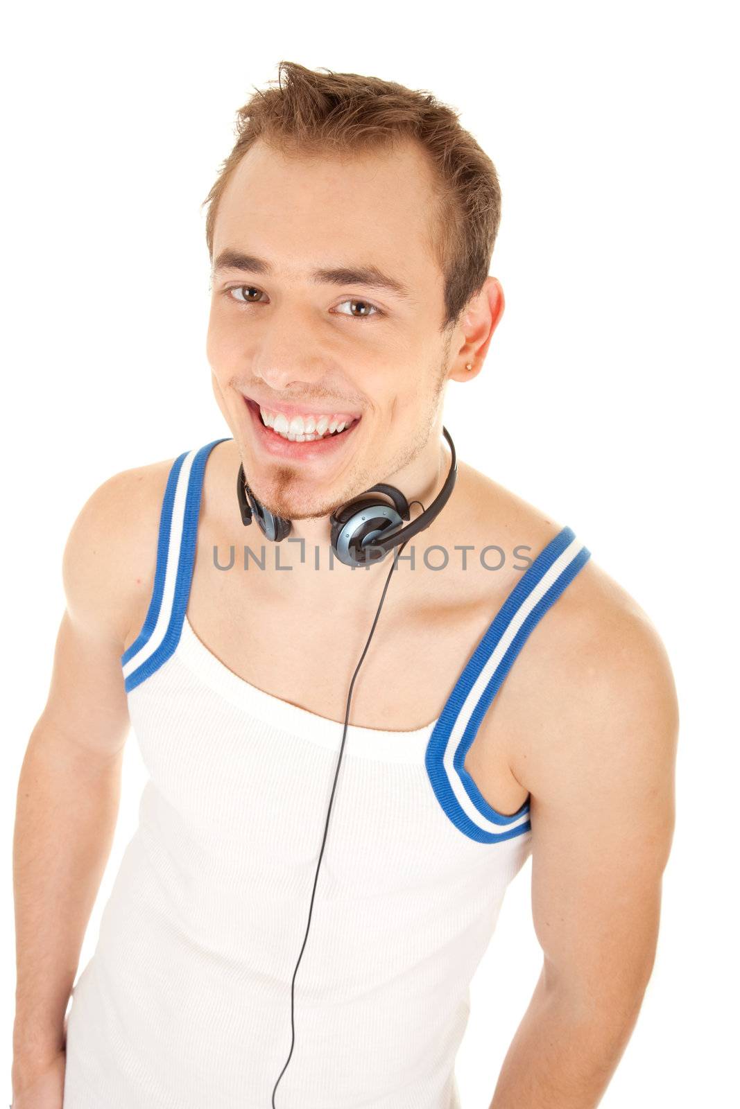 Smiling handsome young man in casual style with headphones, isolated on white background