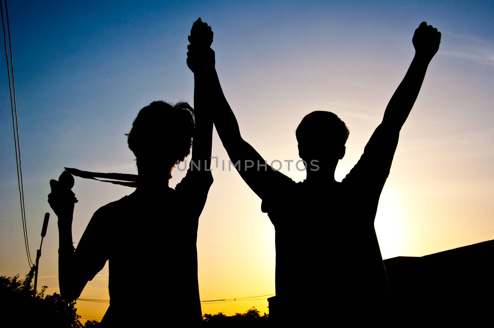 silhouette of man with medal prize