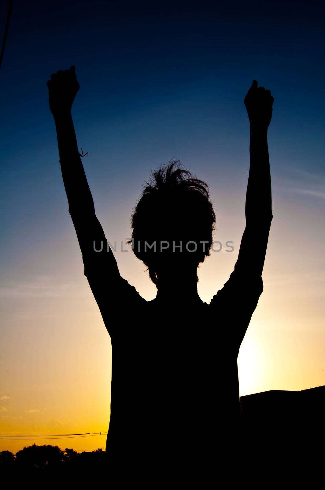 silhouette of man with medal prize