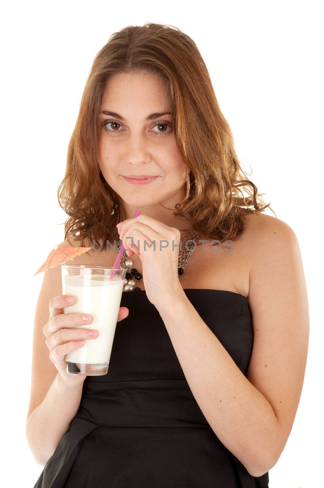 Beautiful women in black dress is holding glass with white drink