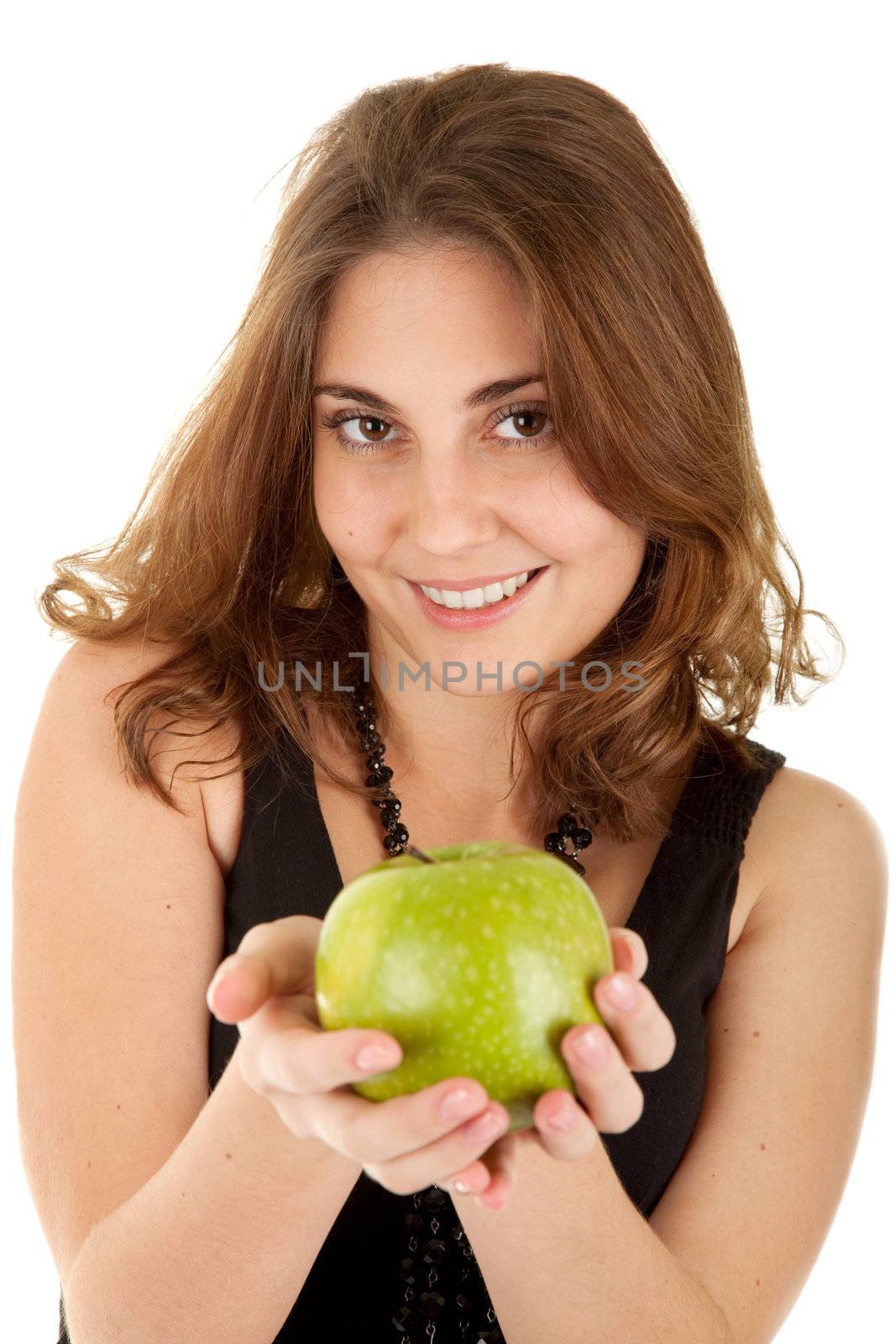 Beauty woman with fresh green apple on white background. Focus on women's eyes.